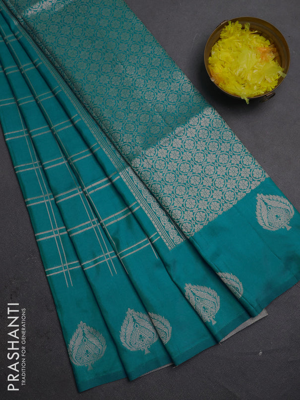 Semi soft silk saree teal blue with allover zari woven checked pattern and zari woven butta border