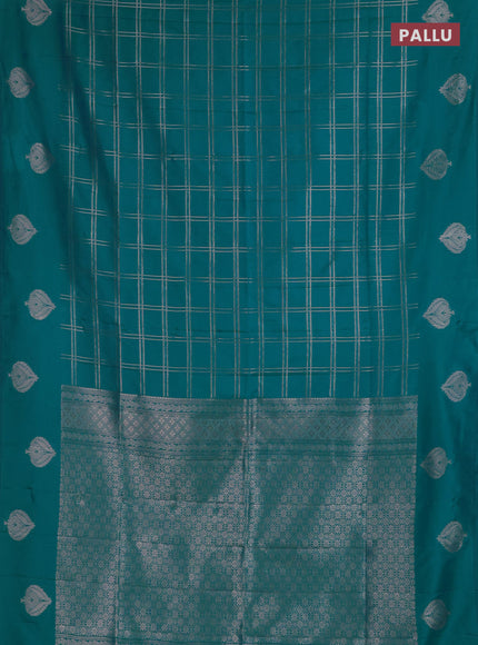 Semi soft silk saree teal blue with allover zari woven checked pattern and zari woven butta border