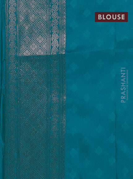 Semi soft silk saree teal blue with allover zari woven checked pattern and zari woven butta border
