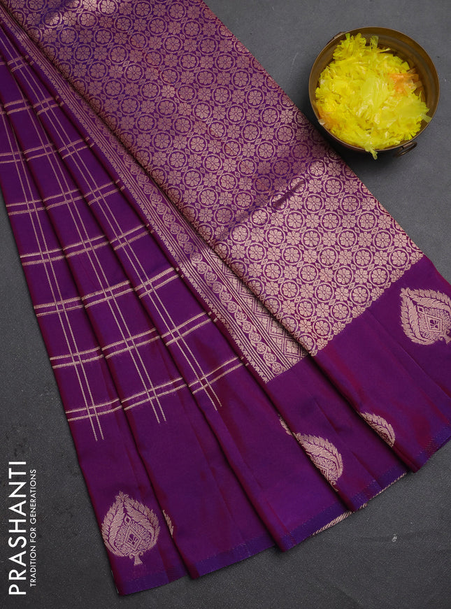 Semi soft silk saree purple with allover zari woven checked pattern and zari woven butta border