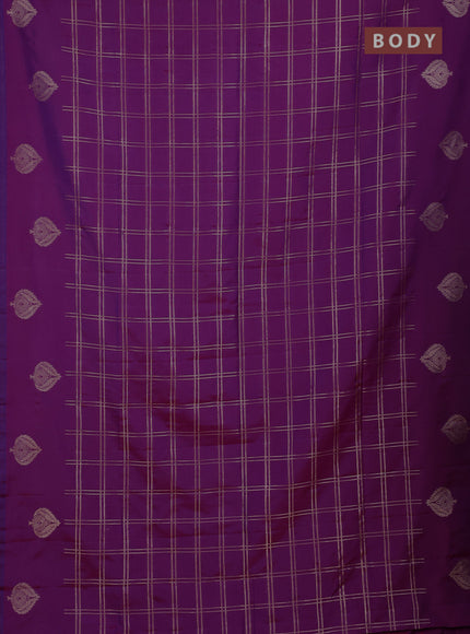 Semi soft silk saree purple with allover zari woven checked pattern and zari woven butta border