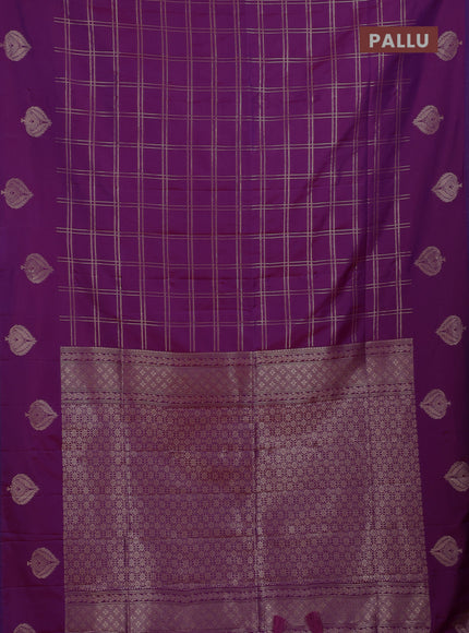 Semi soft silk saree purple with allover zari woven checked pattern and zari woven butta border