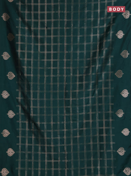 Semi soft silk saree bottle green with allover zari woven checked pattern and zari woven butta border