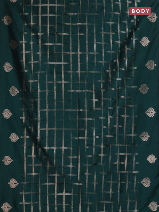 Semi soft silk saree bottle green with allover zari woven checked pattern and zari woven butta border