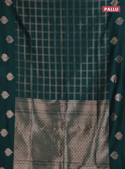 Semi soft silk saree bottle green with allover zari woven checked pattern and zari woven butta border