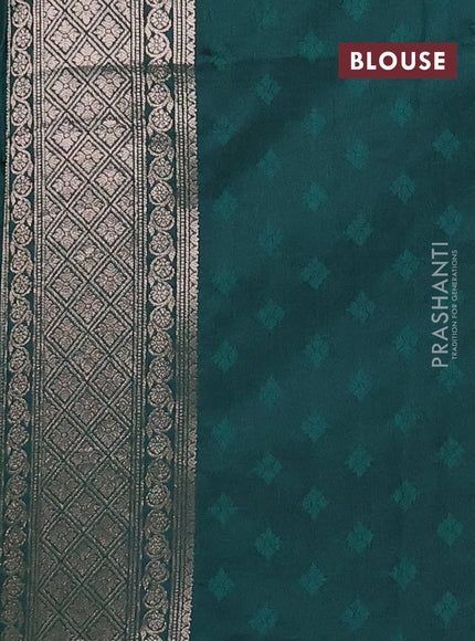Semi soft silk saree bottle green with allover zari woven checked pattern and zari woven butta border
