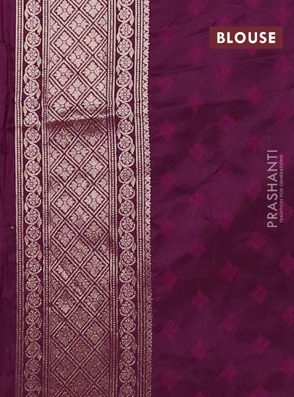 Semi soft silk saree deep purple with allover zari woven checked pattern and zari woven butta border