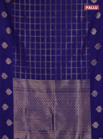 Semi soft silk saree navy blue with allover zari woven checked pattern and zari woven butta border