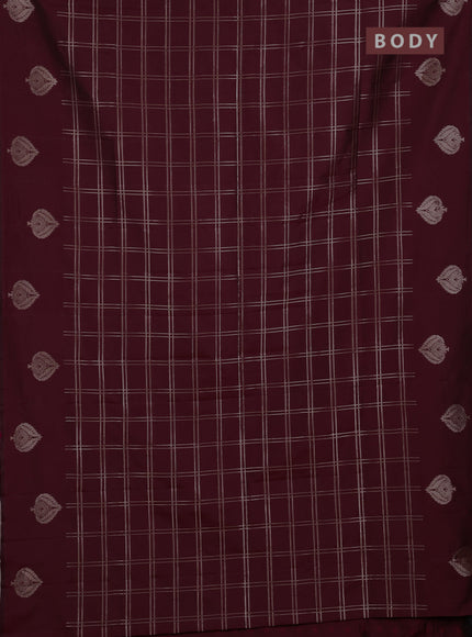 Semi soft silk saree maroon with allover zari woven checked pattern and zari woven butta border