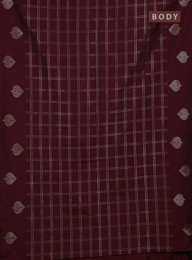 Semi soft silk saree maroon with allover zari woven checked pattern and zari woven butta border