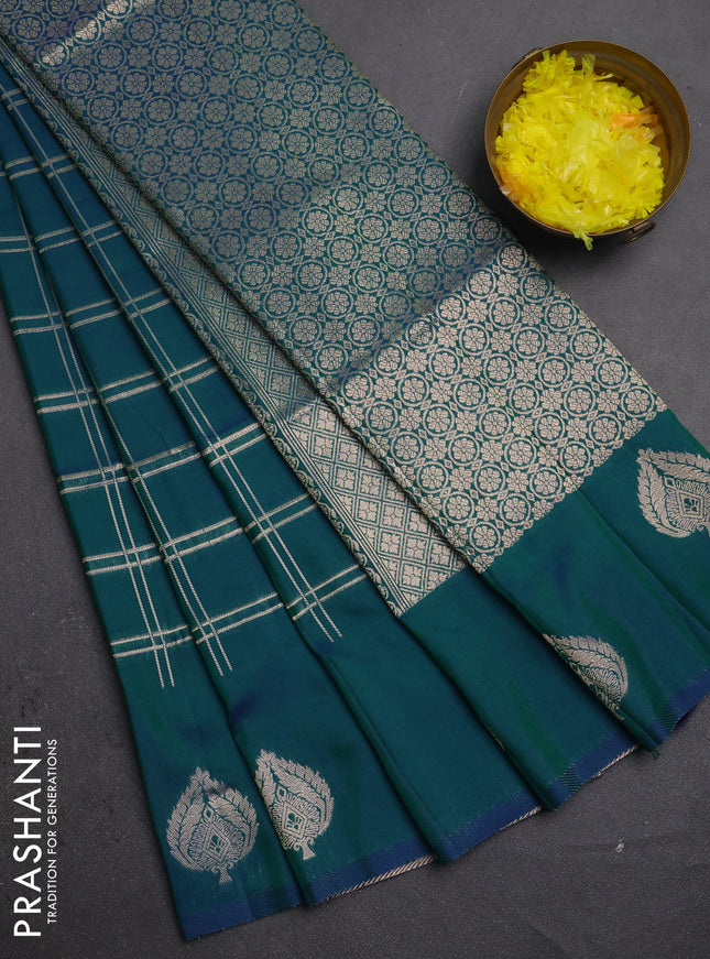 Semi soft silk saree peacock green with allover zari woven checked pattern and zari woven butta border