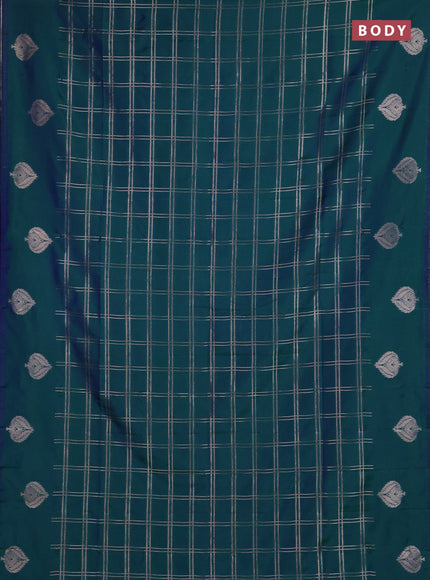 Semi soft silk saree peacock green with allover zari woven checked pattern and zari woven butta border