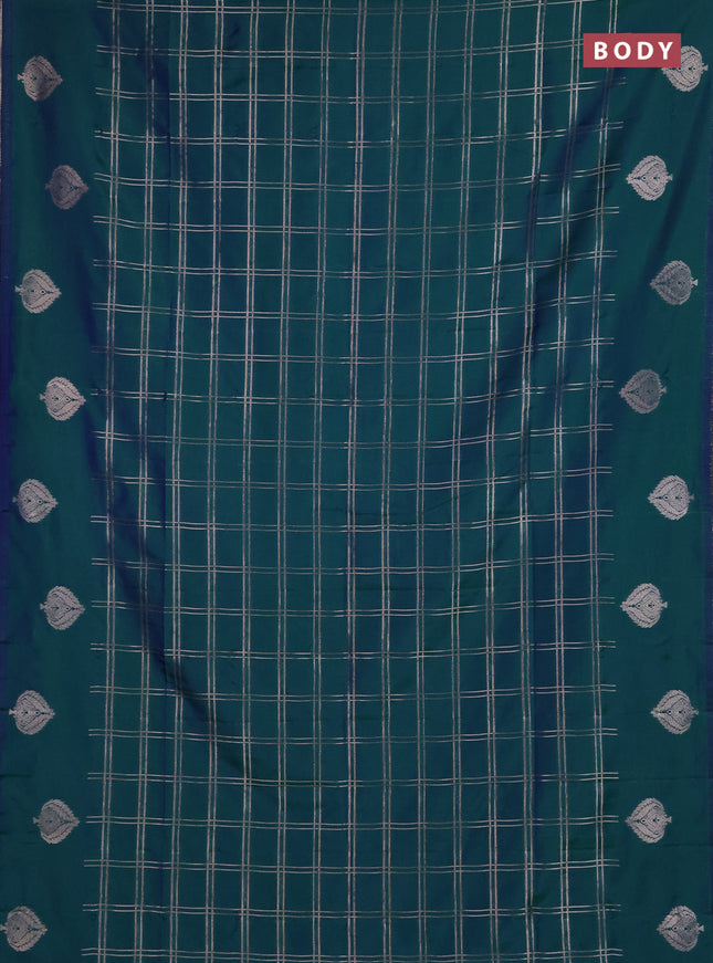 Semi soft silk saree peacock green with allover zari woven checked pattern and zari woven butta border