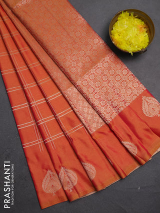Semi soft silk saree sunset orange with allover zari woven checked pattern and zari woven butta border
