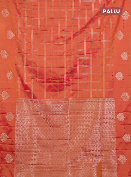 Semi soft silk saree sunset orange with allover zari woven checked pattern and zari woven butta border