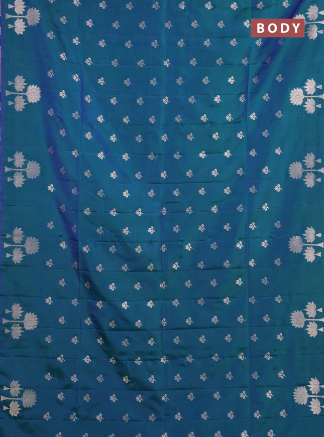 Semi soft silk saree peacock green with allover zari woven buttas and zari woven butta border