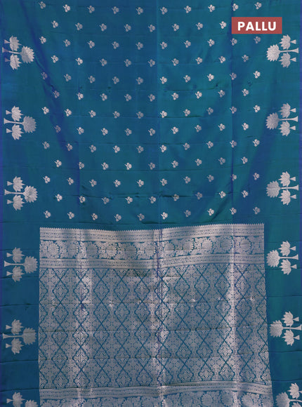 Semi soft silk saree peacock green with allover zari woven buttas and zari woven butta border