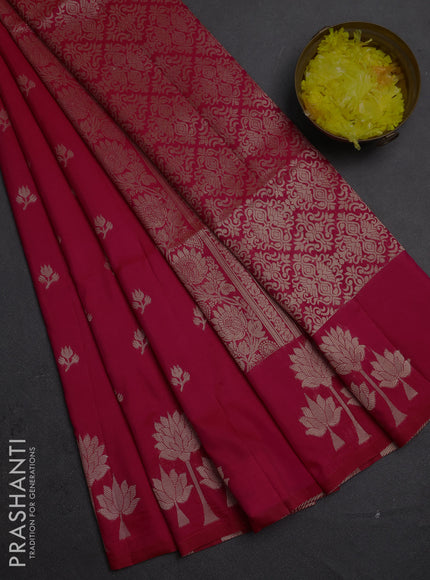 Semi soft silk saree tomato pink with allover zari woven buttas and zari woven butta border