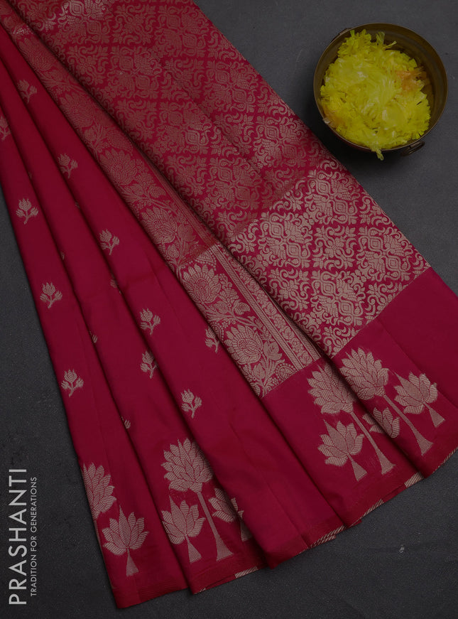Semi soft silk saree tomato pink with allover zari woven buttas and zari woven butta border