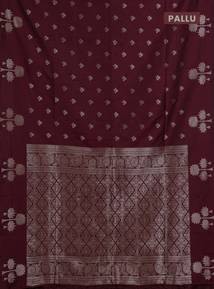 Semi soft silk saree maroon with allover zari woven buttas and zari woven butta border
