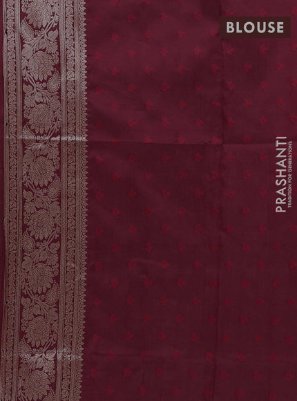 Semi soft silk saree maroon with allover zari woven buttas and zari woven butta border