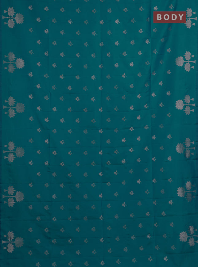 Semi soft silk saree teal blue with allover zari woven buttas and zari woven butta border