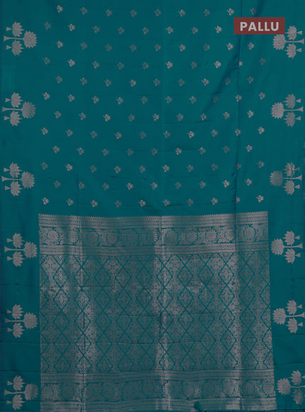 Semi soft silk saree teal blue with allover zari woven buttas and zari woven butta border