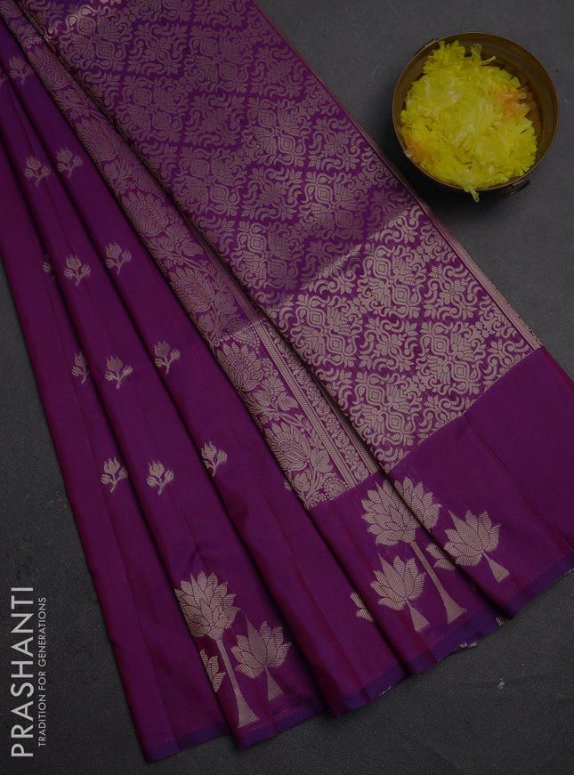 Semi soft silk saree purple with allover zari woven buttas and zari woven butta border