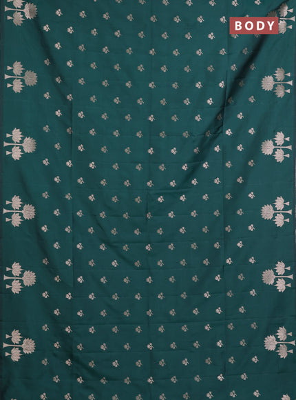Semi soft silk saree bottle green with allover zari woven buttas and zari woven butta border
