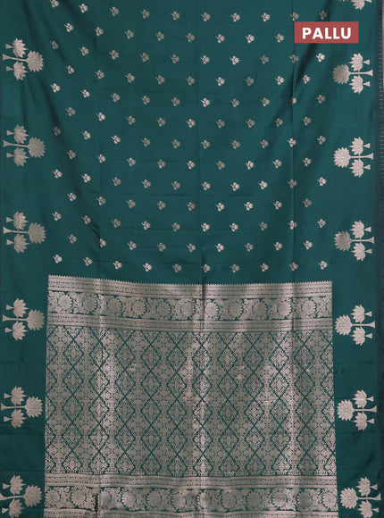 Semi soft silk saree bottle green with allover zari woven buttas and zari woven butta border