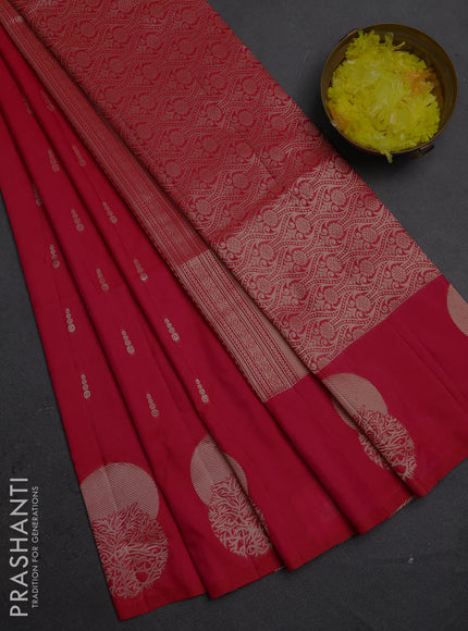 Semi soft silk saree tomato pink with allover zari woven buttas and zari woven butta border