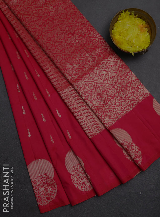 Semi soft silk saree tomato pink with allover zari woven buttas and zari woven butta border