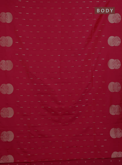 Semi soft silk saree tomato pink with allover zari woven buttas and zari woven butta border