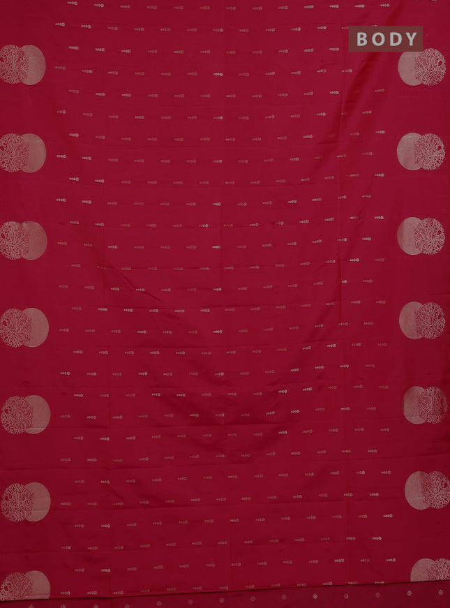 Semi soft silk saree tomato pink with allover zari woven buttas and zari woven butta border