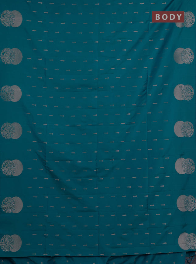 Semi soft silk saree teal blue with allover zari woven buttas and zari woven butta border