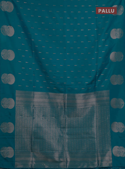 Semi soft silk saree teal blue with allover zari woven buttas and zari woven butta border