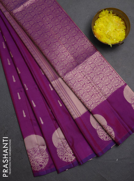 Semi soft silk saree purple with allover zari woven buttas and zari woven butta border