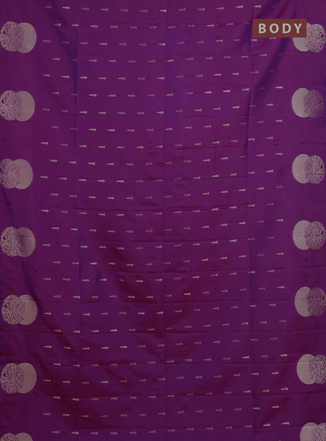 Semi soft silk saree purple with allover zari woven buttas and zari woven butta border