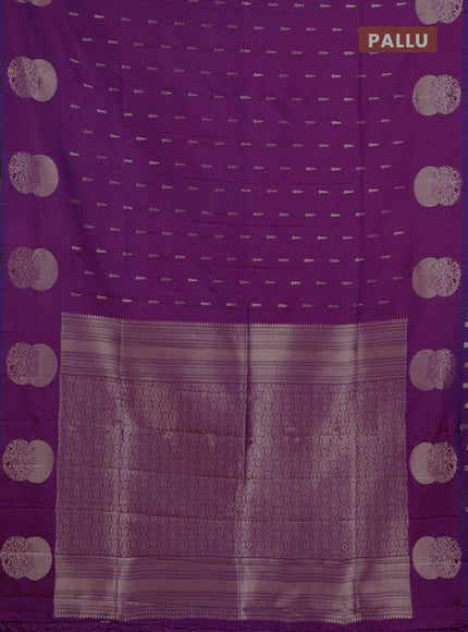 Semi soft silk saree purple with allover zari woven buttas and zari woven butta border