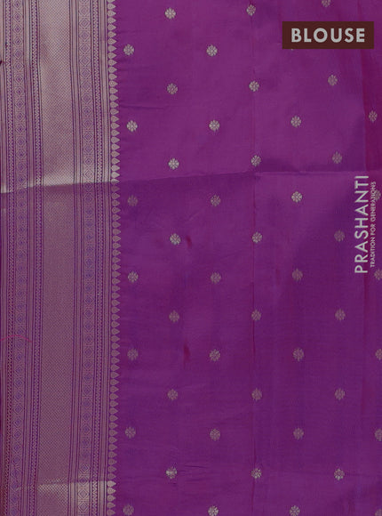 Semi soft silk saree purple with allover zari woven buttas and zari woven butta border