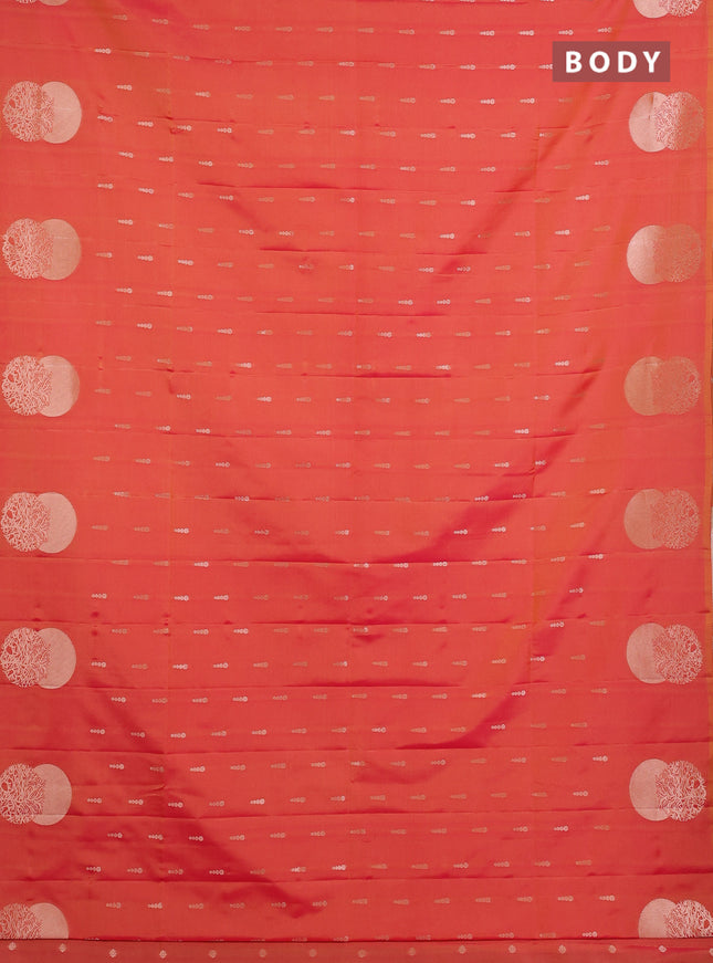 Semi soft silk saree sunset orange with allover zari woven buttas and zari woven butta border
