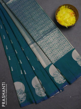 Semi soft silk saree peacock green with allover zari woven buttas and zari woven butta border