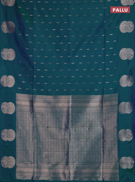 Semi soft silk saree peacock green with allover zari woven buttas and zari woven butta border