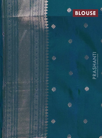 Semi soft silk saree peacock green with allover zari woven buttas and zari woven butta border