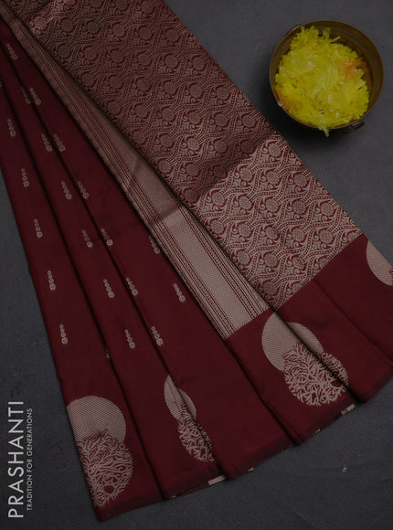 Semi soft silk saree maroon with allover zari woven buttas and zari woven butta border
