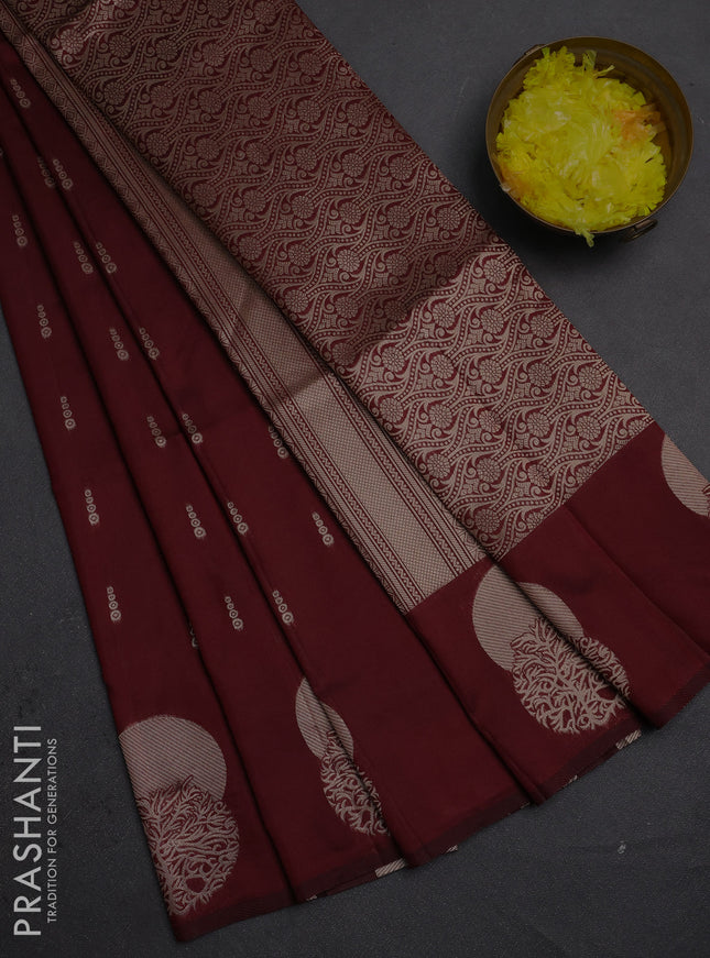Semi soft silk saree maroon with allover zari woven buttas and zari woven butta border