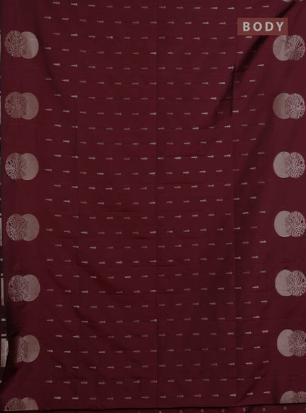 Semi soft silk saree maroon with allover zari woven buttas and zari woven butta border