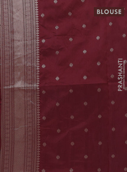 Semi soft silk saree maroon with allover zari woven buttas and zari woven butta border