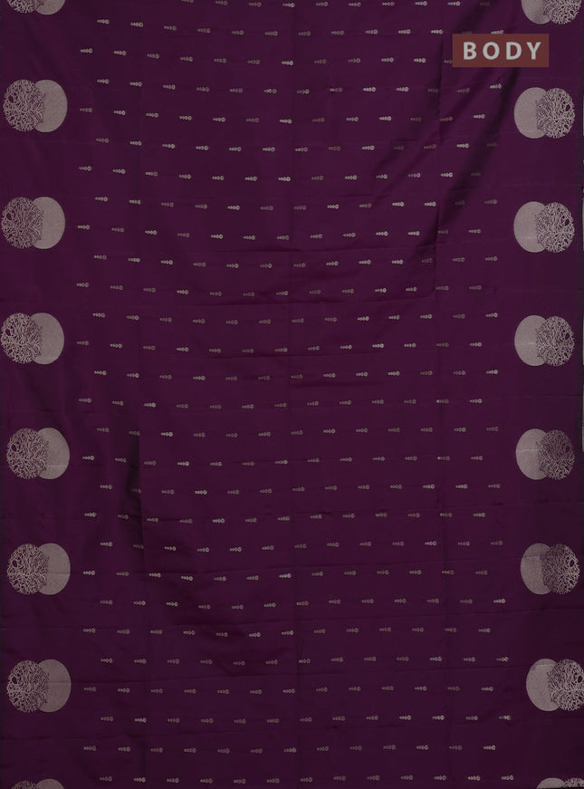 Semi soft silk saree deep purple with allover zari woven buttas and zari woven butta border
