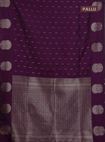Semi soft silk saree deep purple with allover zari woven buttas and zari woven butta border